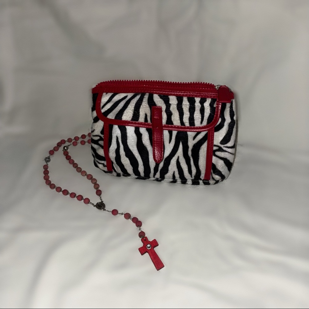 The perfect unique accessory a womens zebra print wristlet